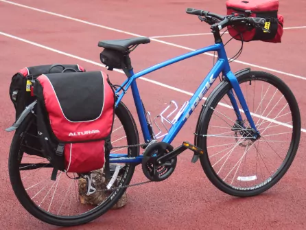 Flat bar touring bike with panniers and barbag